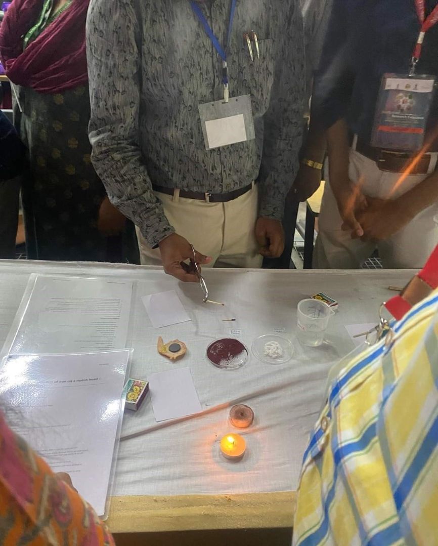 A man prepares to do an experiment featuring a match