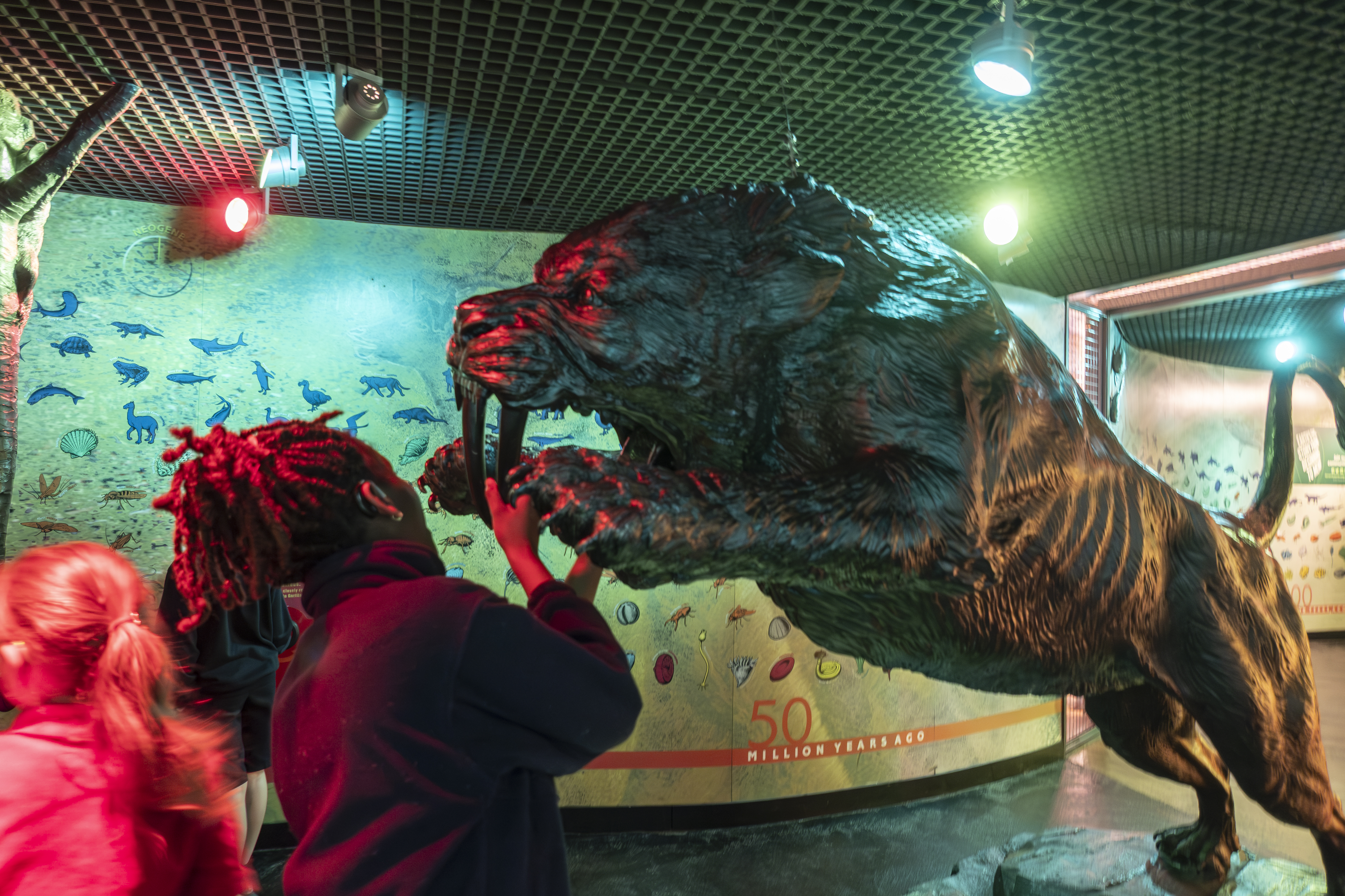 A sculpture of a big cat pounces on a visitor to the Casualties and Survivors Gallery