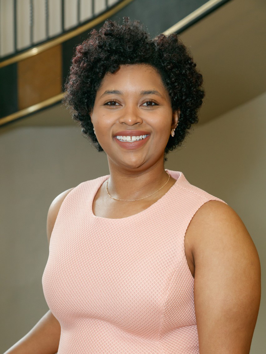 Head and shoulders formal shot of Devin