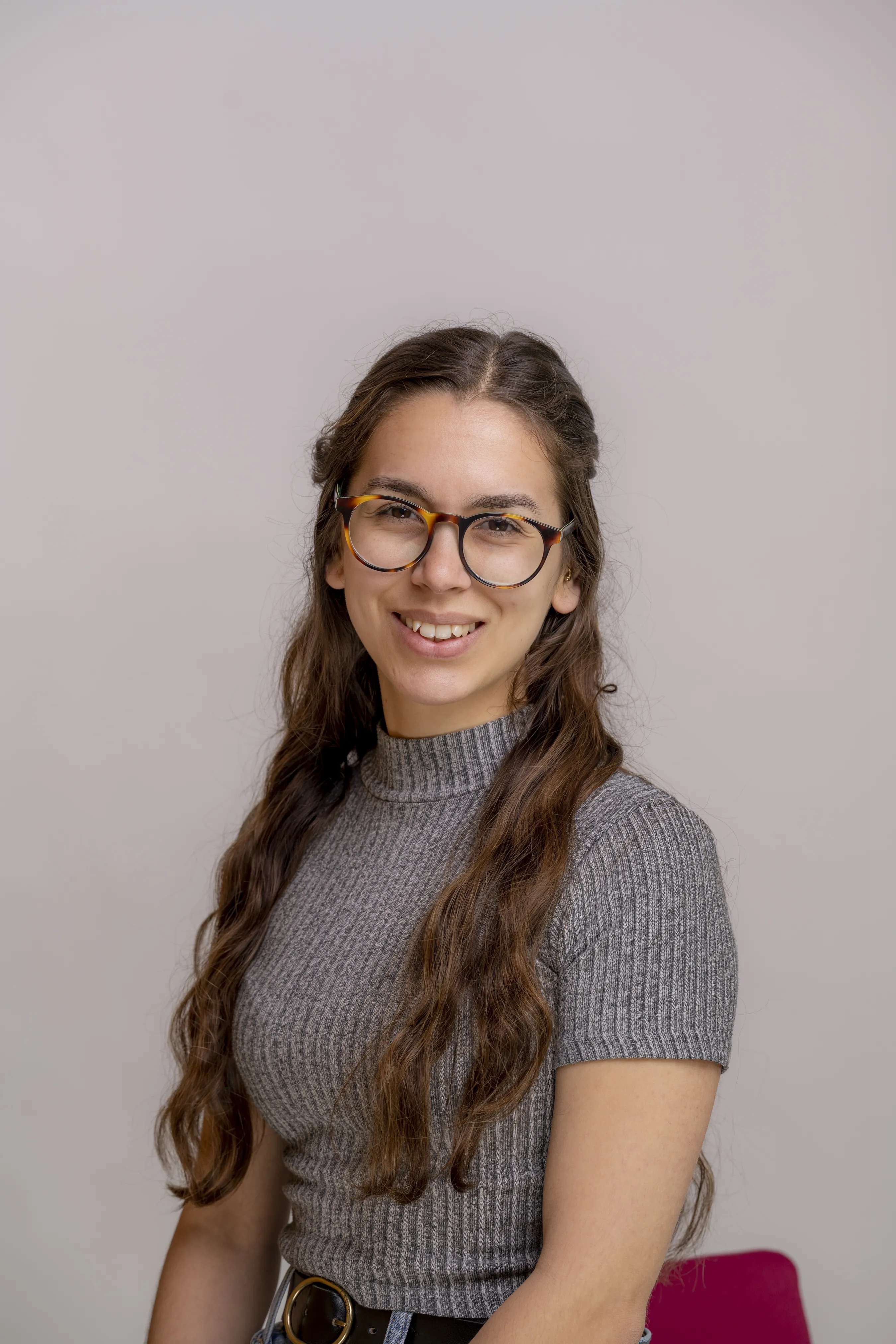 jo-fish.jpg A portrait picture of a smiling Johanna Fish wearing glasses and a grey T-shirt
