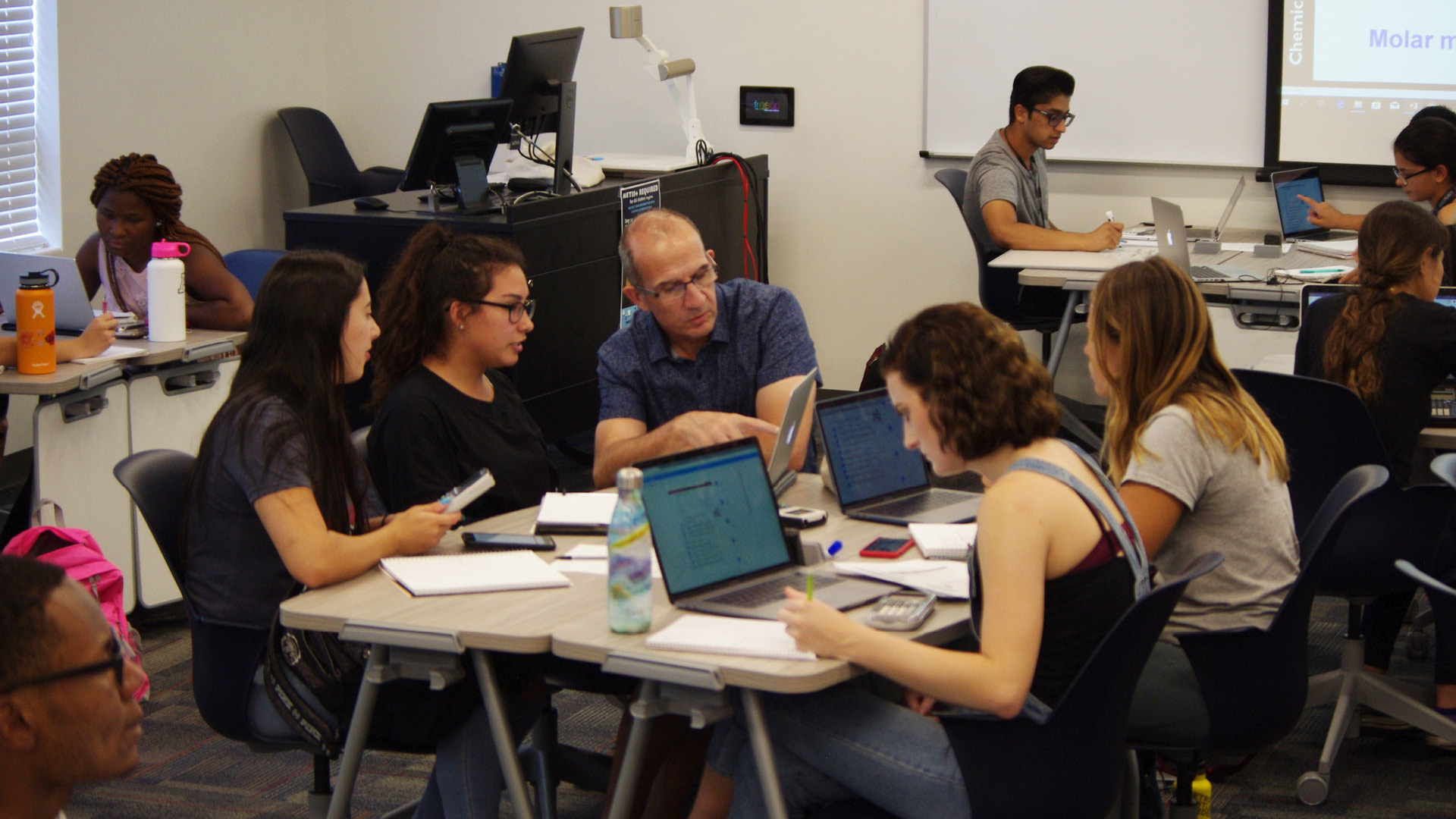Vicente Talanquer teaching group of students at desks with laptops