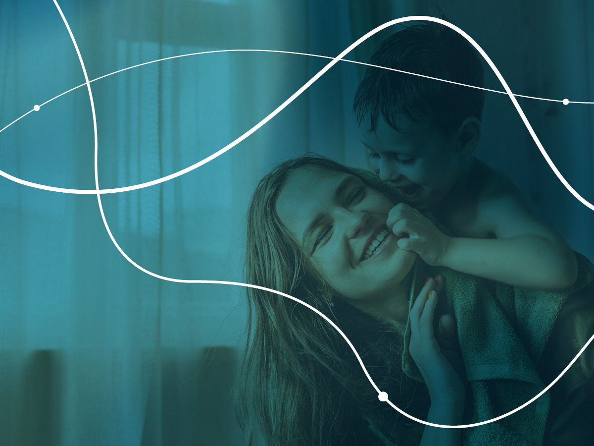 child playing on a persons shoulders