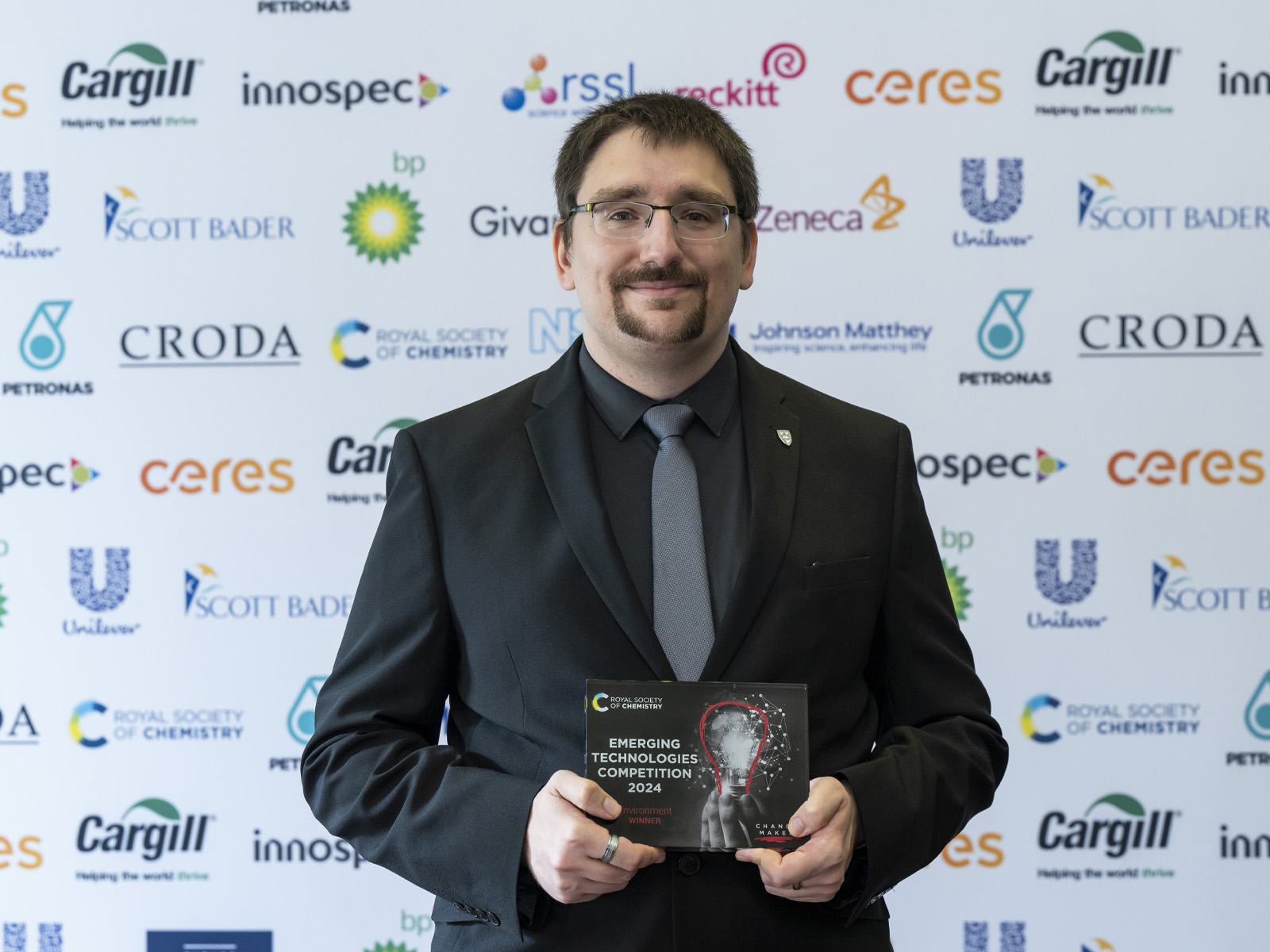 Liam Dodd, Chief Operating Officer, ThioTech Ltd, holds the 2024 Environment award