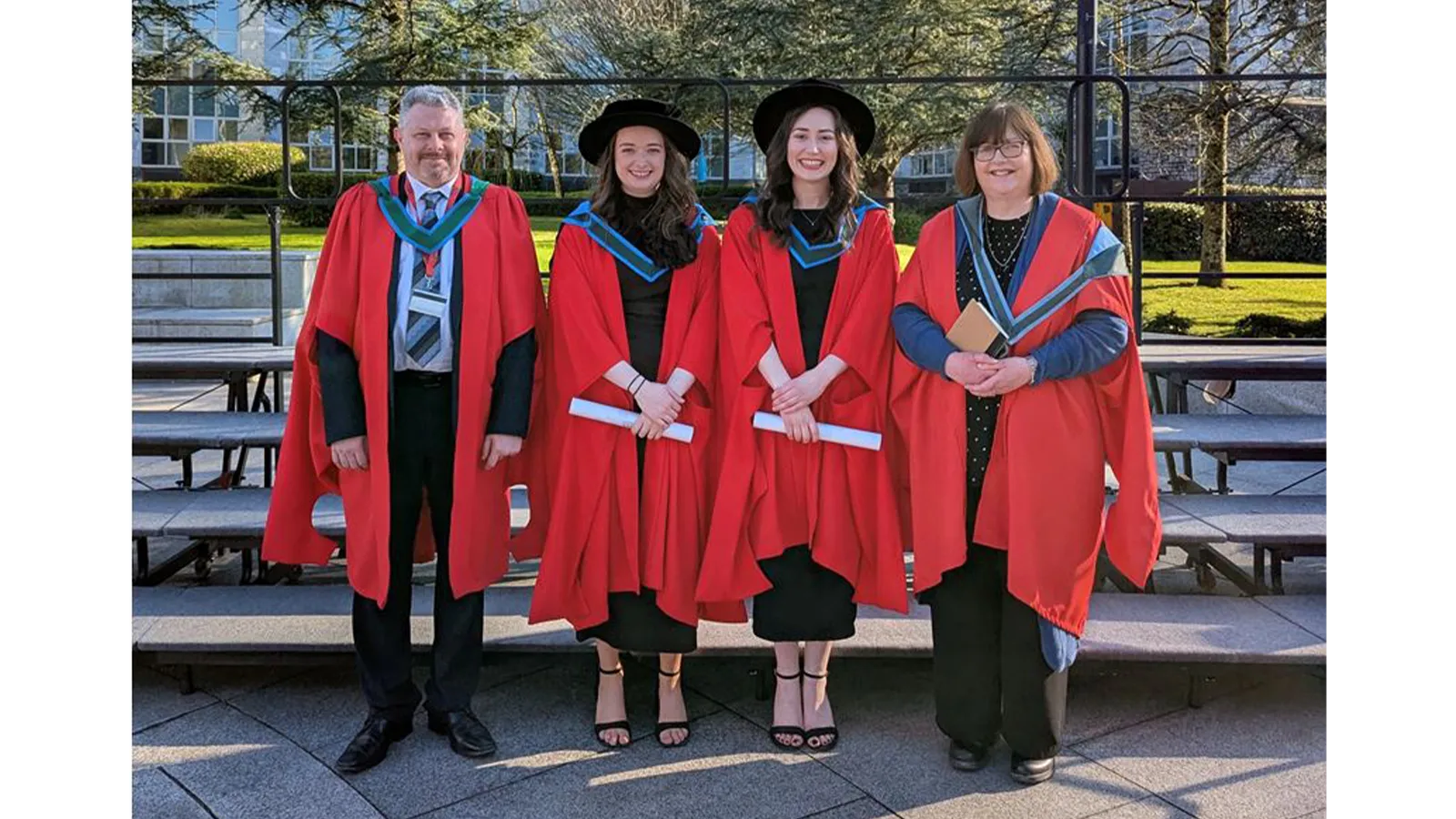 Professor Anita Maguire and others wearing graduation gowns