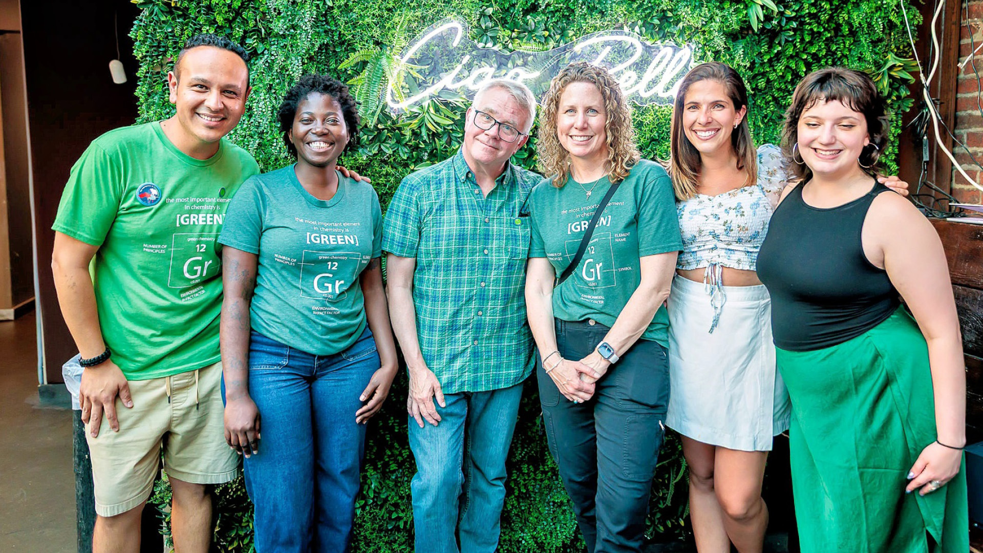 Some of The Green Chemistry Commitment posing in green outfits