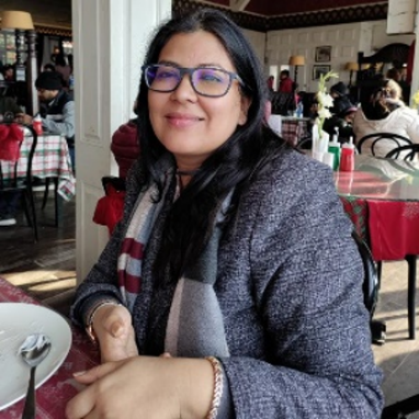 a woman sitting at a table