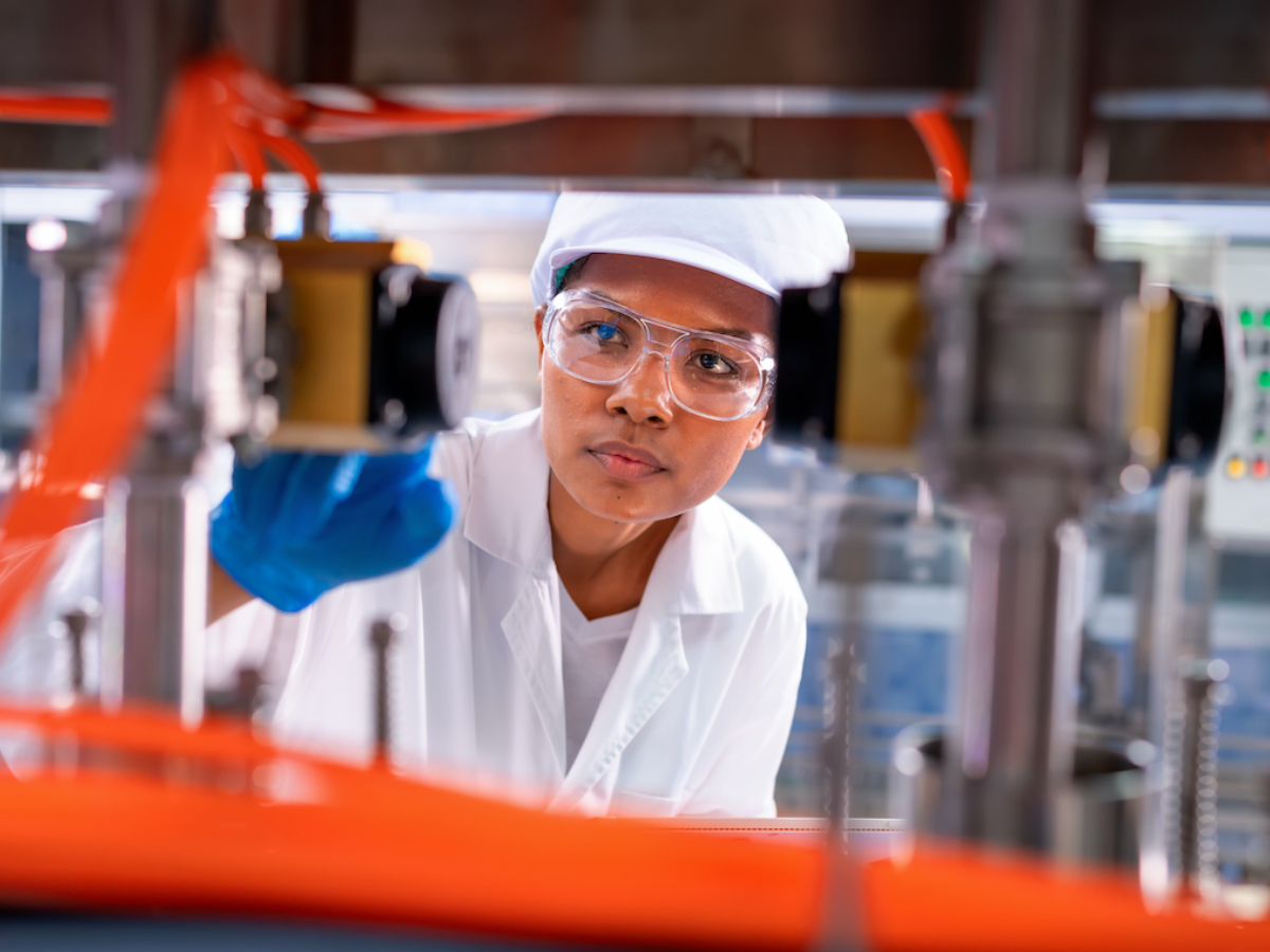 Scientist looking at equipment
