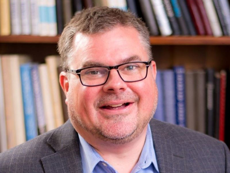 A headshot of Ryan Richards