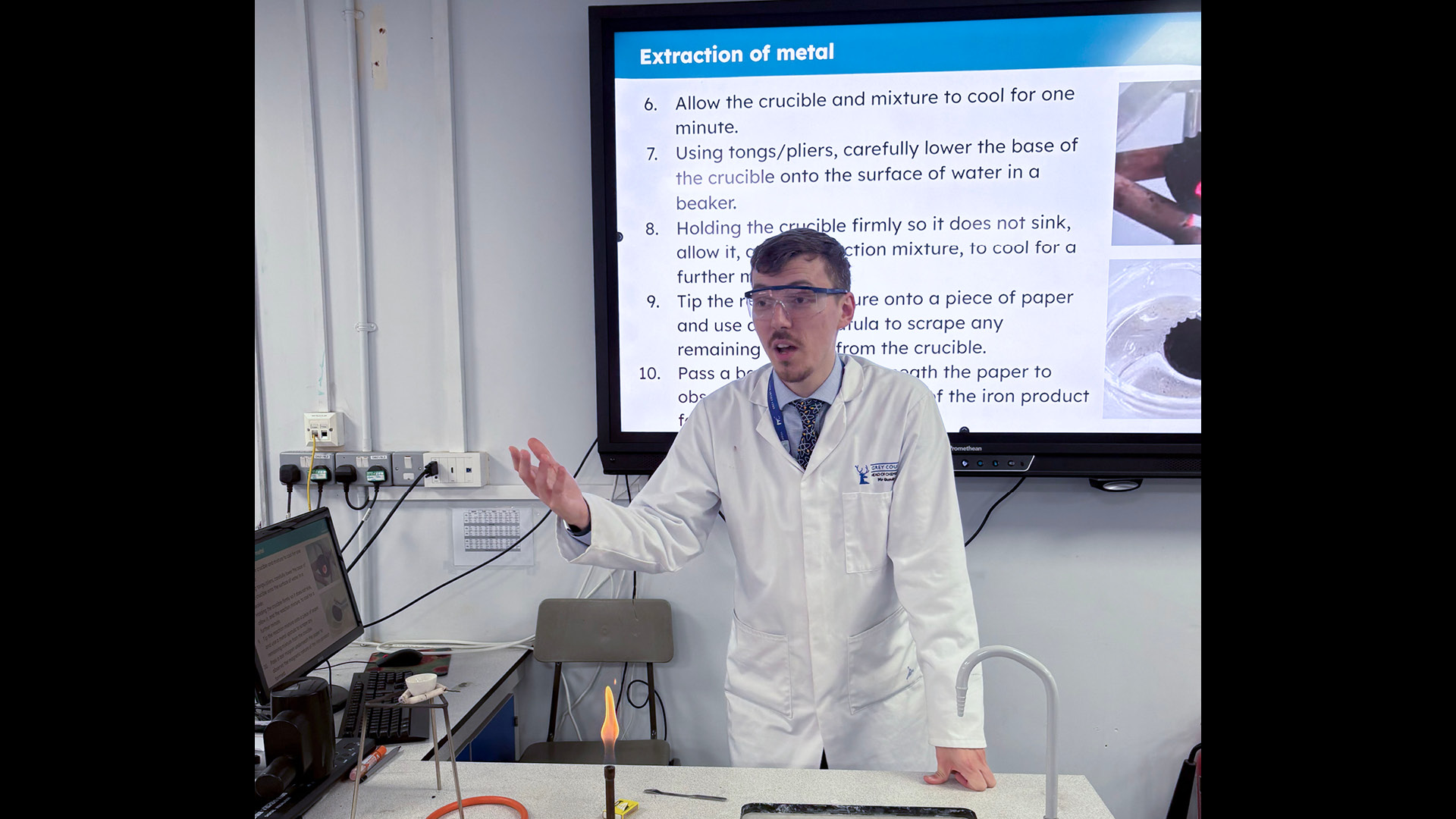 Matthew Gundry in lab with white board, teaching