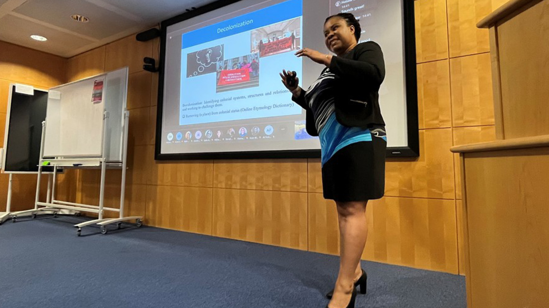 University of York "Decolonising the Chemistry Curriculum" Group lecturer in front of white board