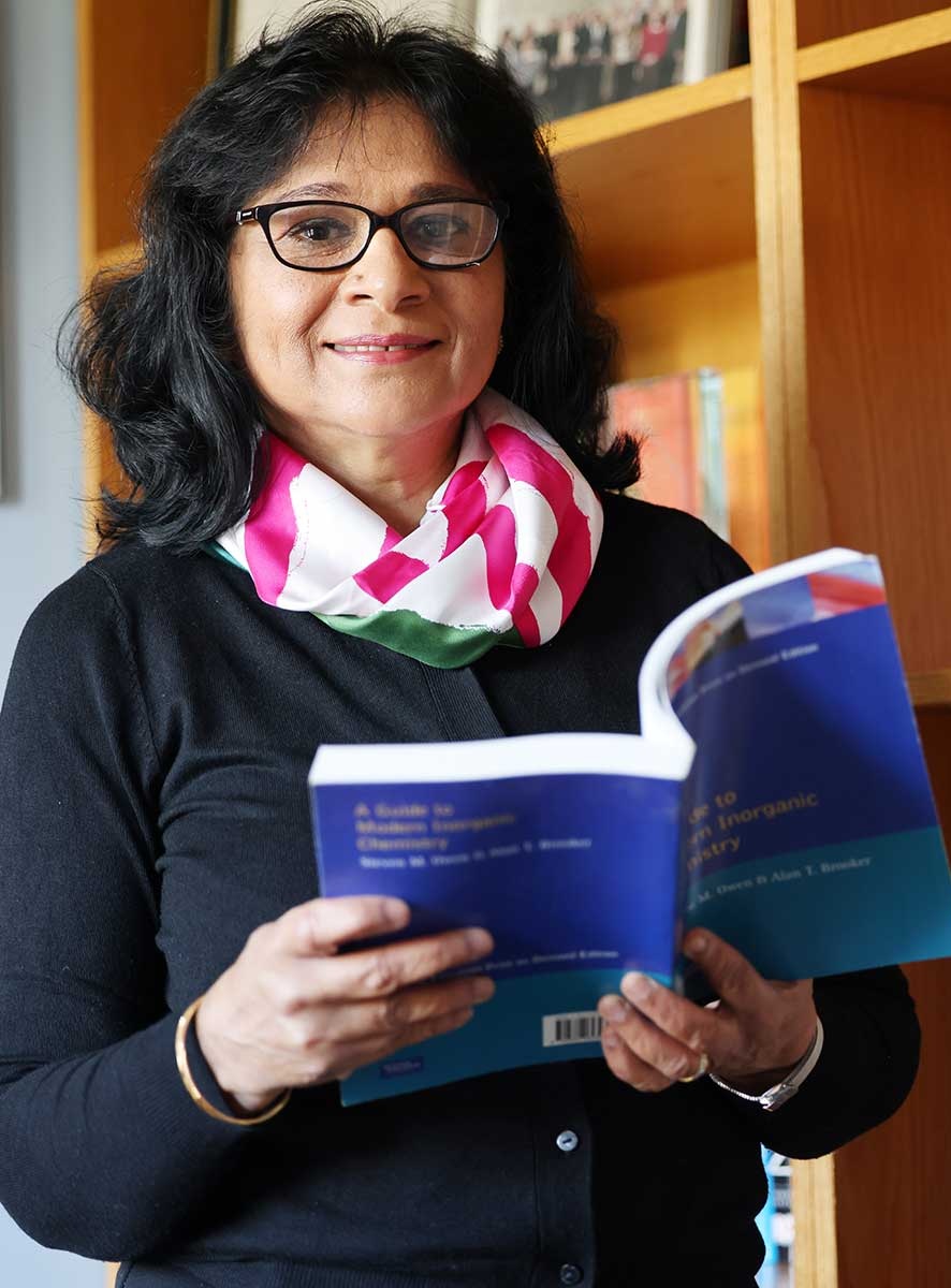 a woman holding a book