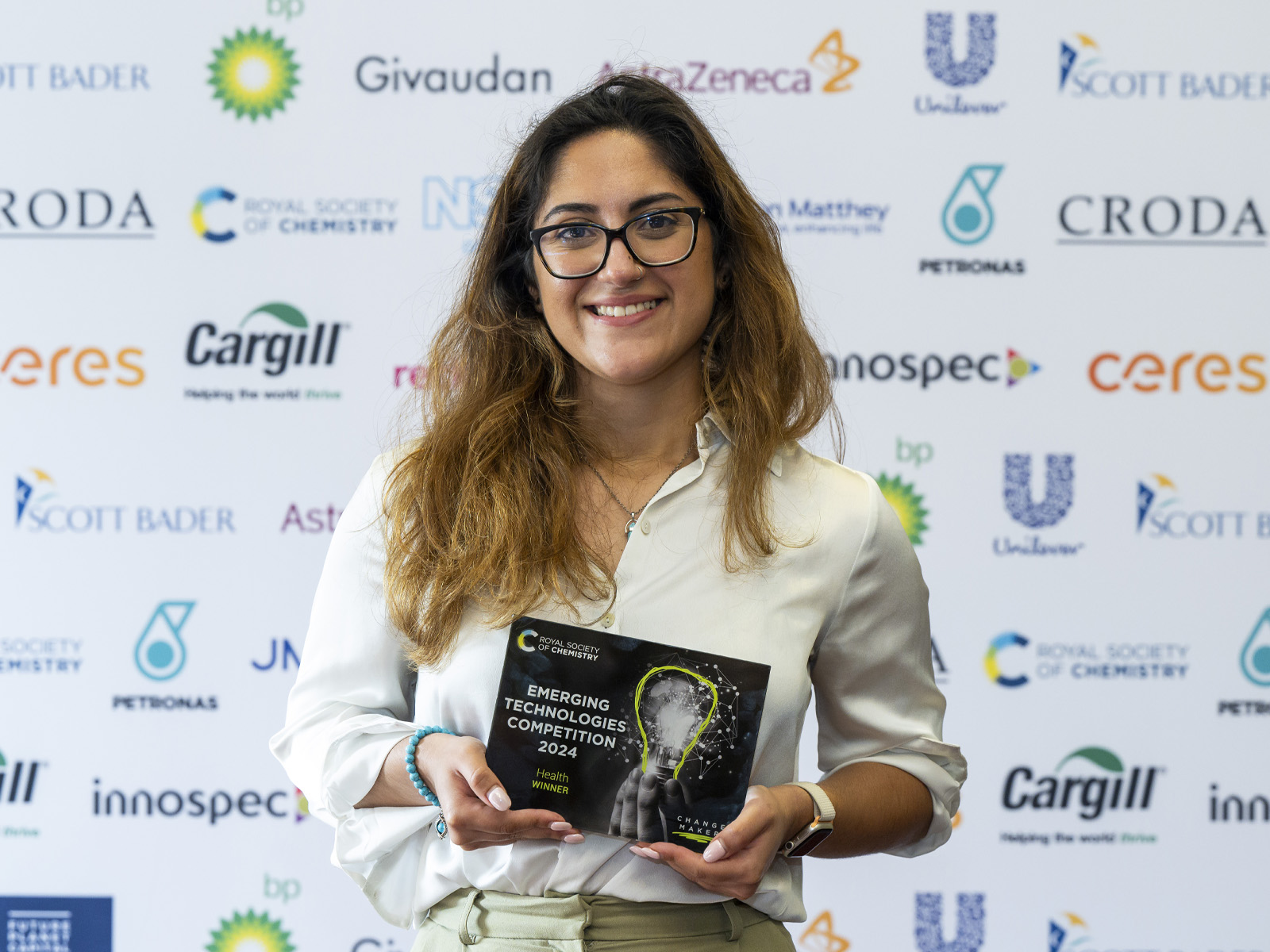 Ignota Labs'  chief data science officer Layla Hosseini-Gerami holds the 2024 Health award at the Emerging Technologies Competition 2024 final