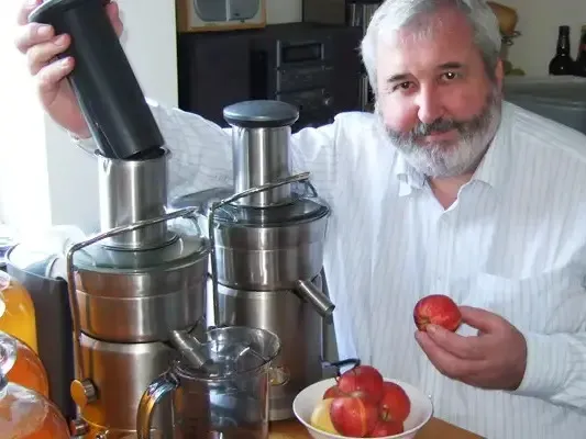 Nevin Stewart Nevin Stewart holds an apple before putting it through a Juice and Strain machine