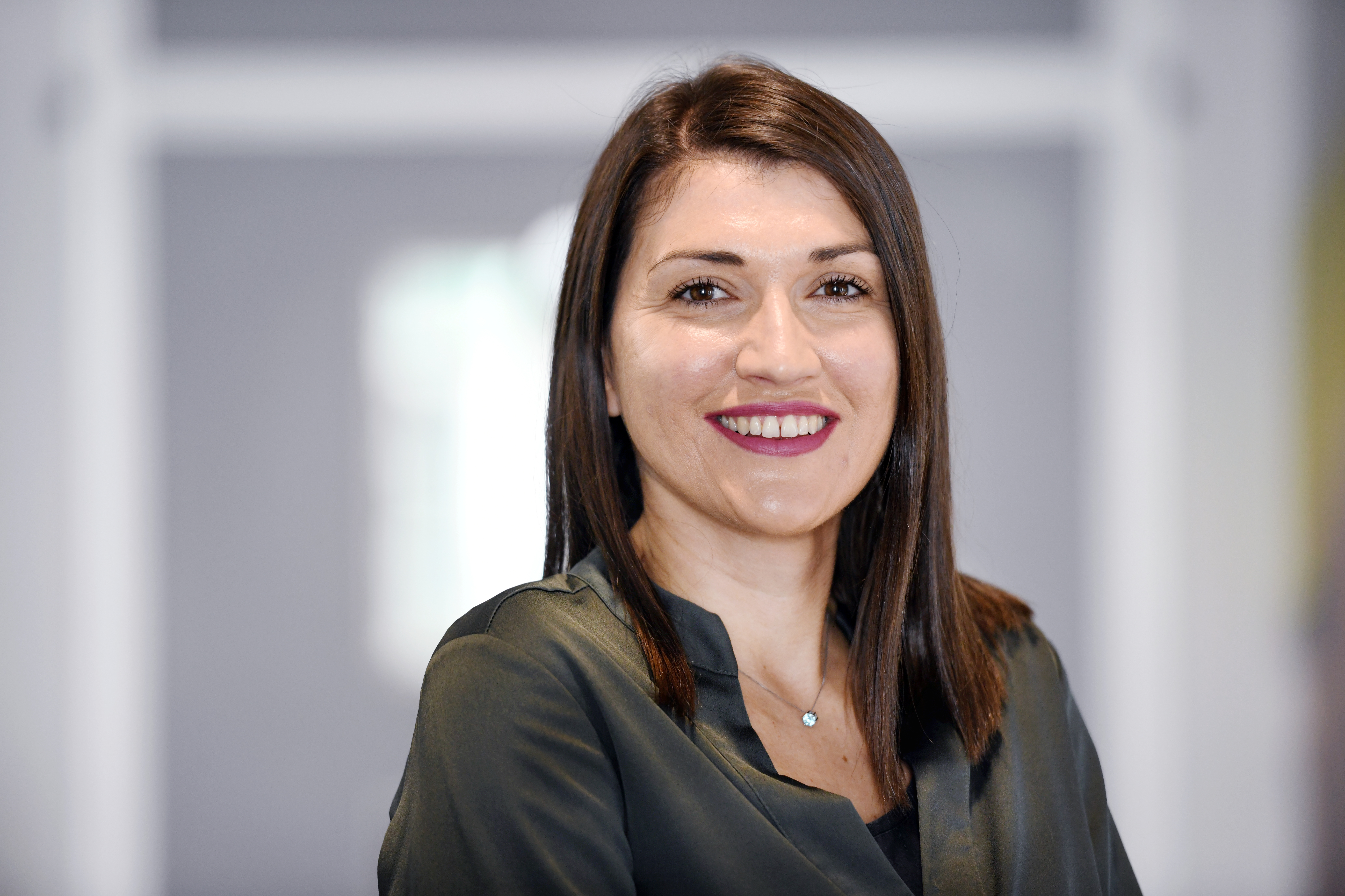 a woman smiling at camera