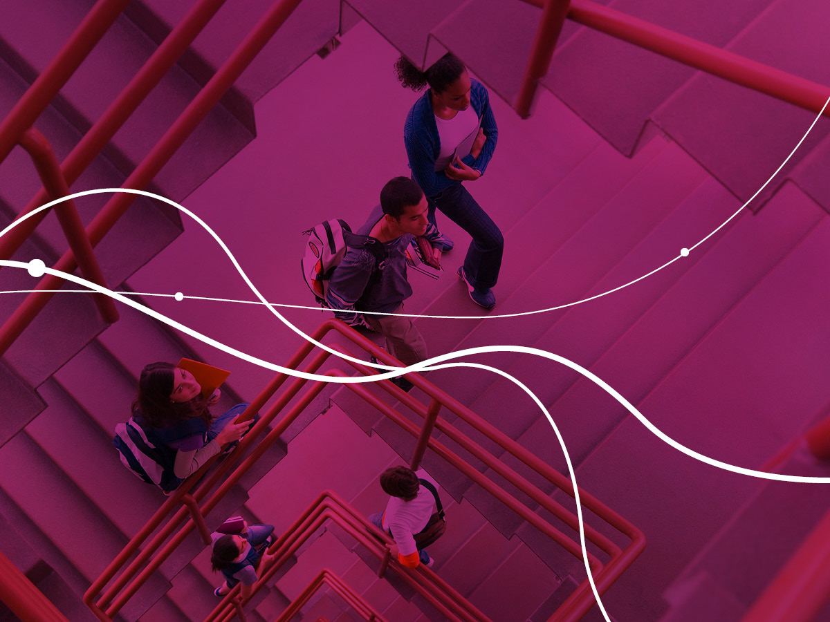 people walking up a staircase