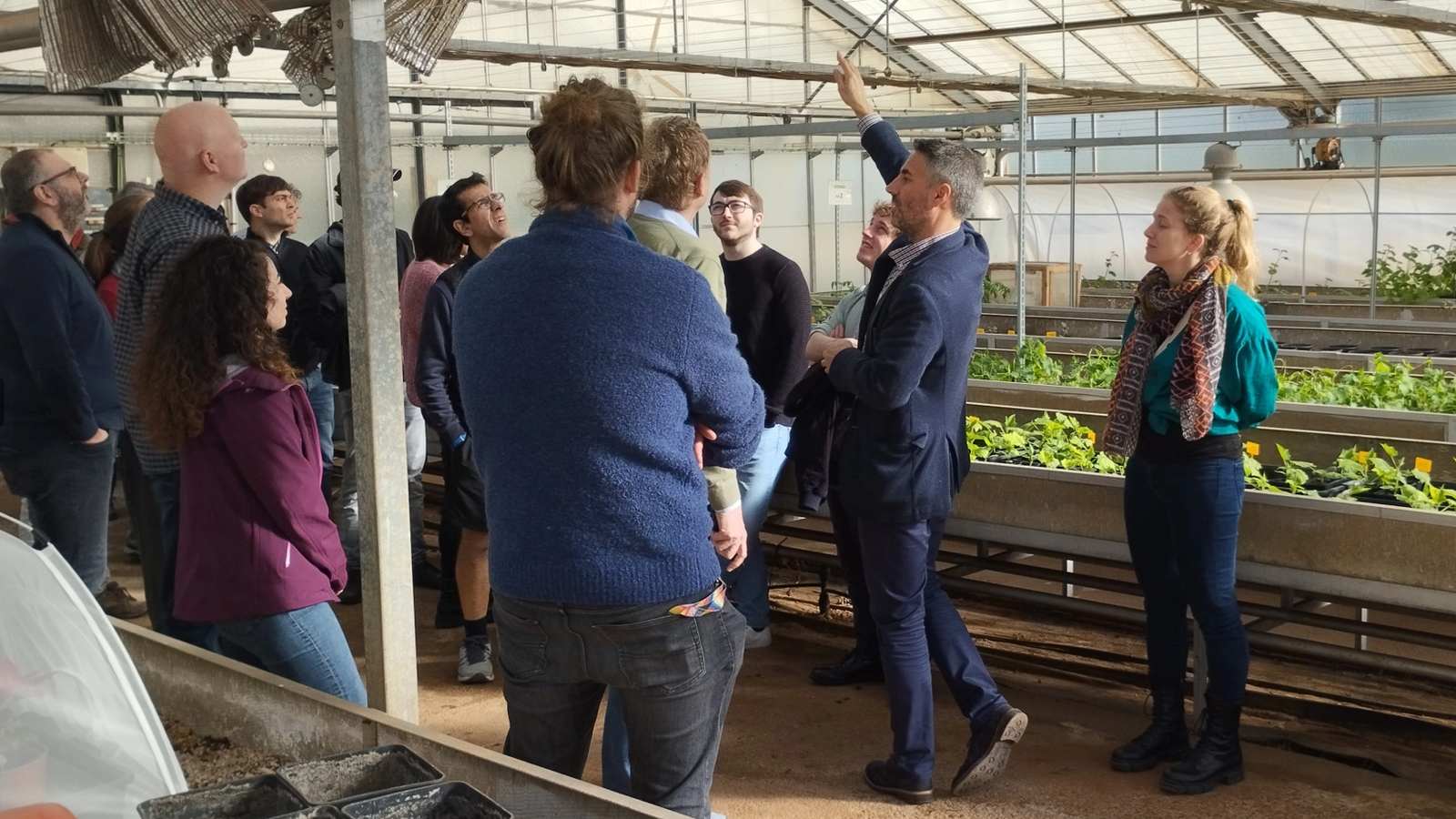 The BoostCrop team giving a tour in a green house