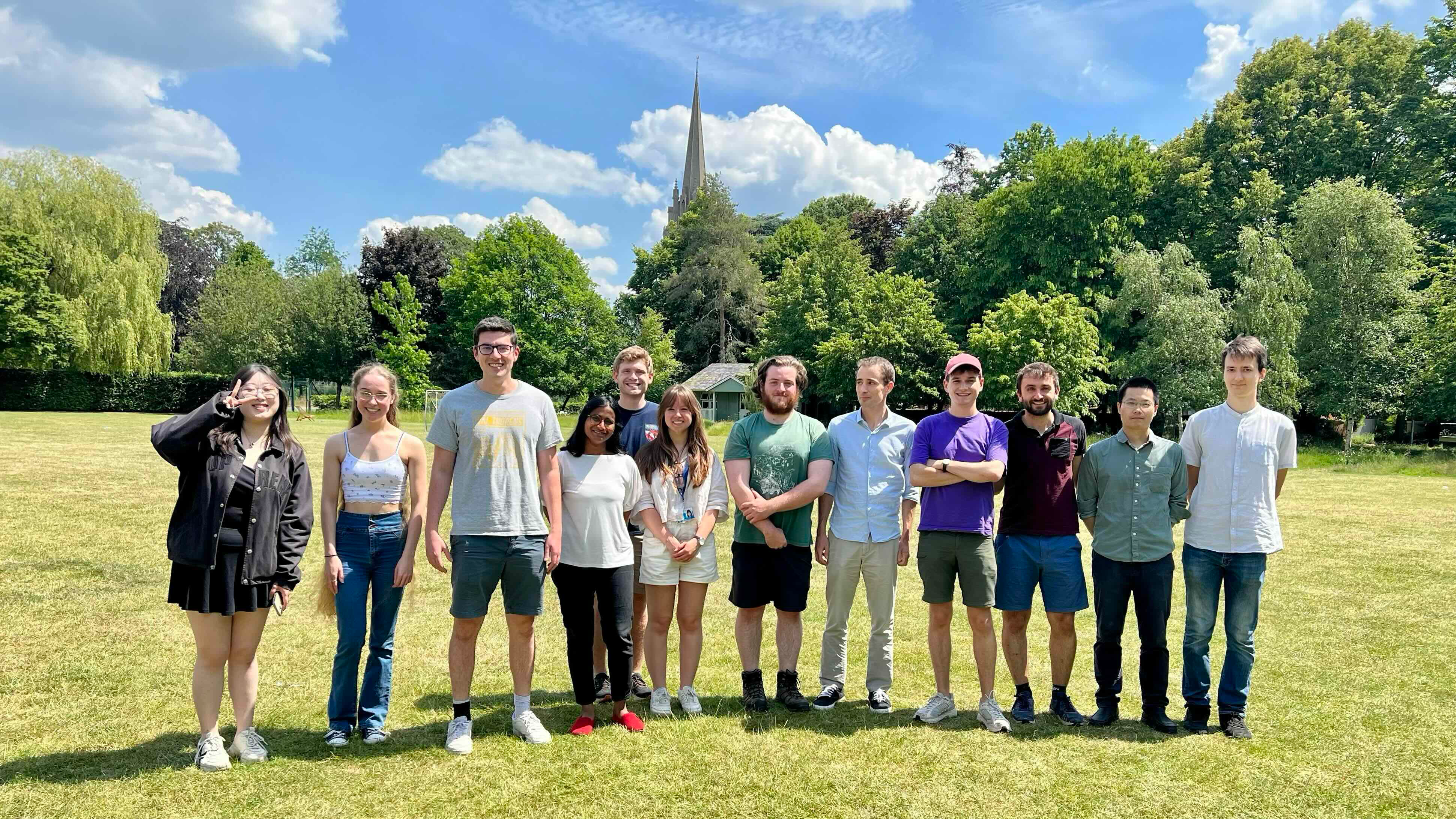 Dr Pietro Sormanni with a group of people standing in a field