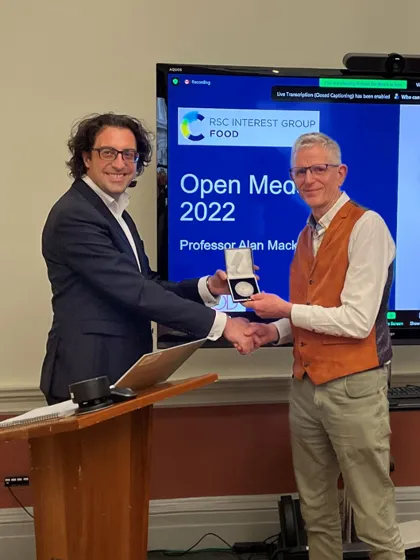 Food Group Chair Robert Cordina (left) presenting Prof. Alan Mackie (right) with the Food Group Open Career Medal 2022