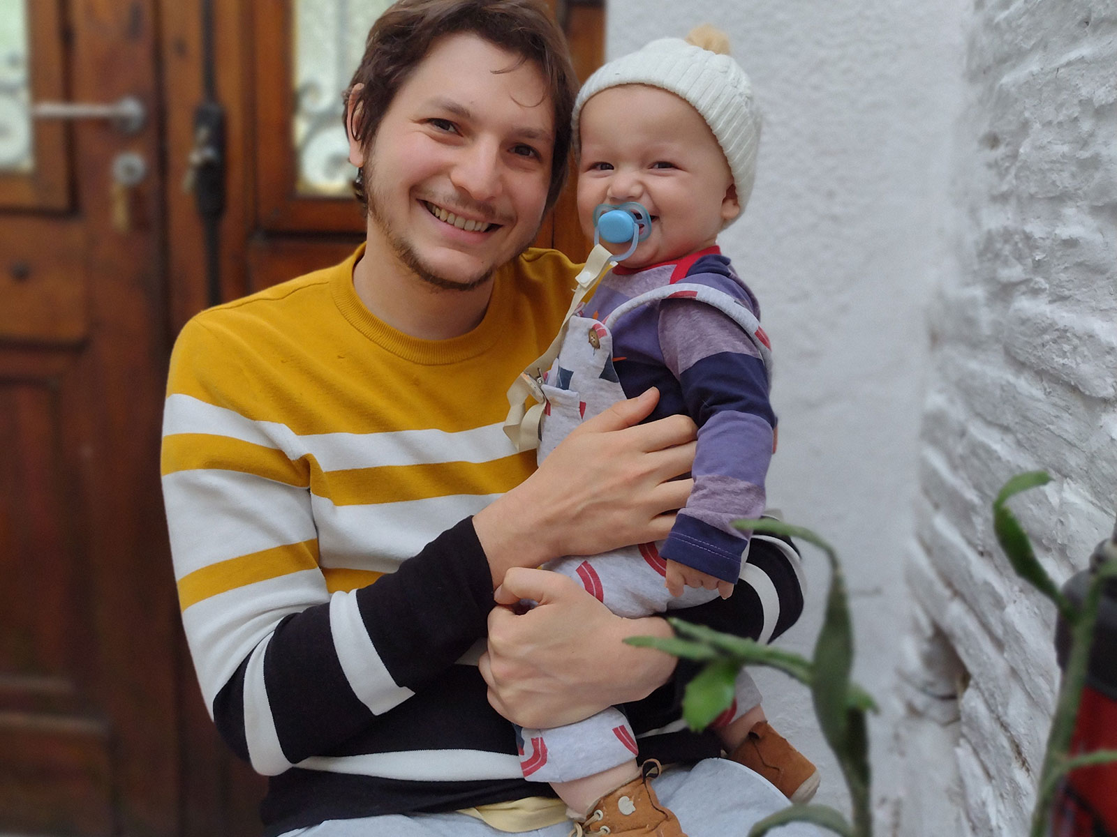 Julian Gargiulo, Assistant investigator at CIBION, Argentina applied for our Research Fund. he is pictured holding his smiling baby.