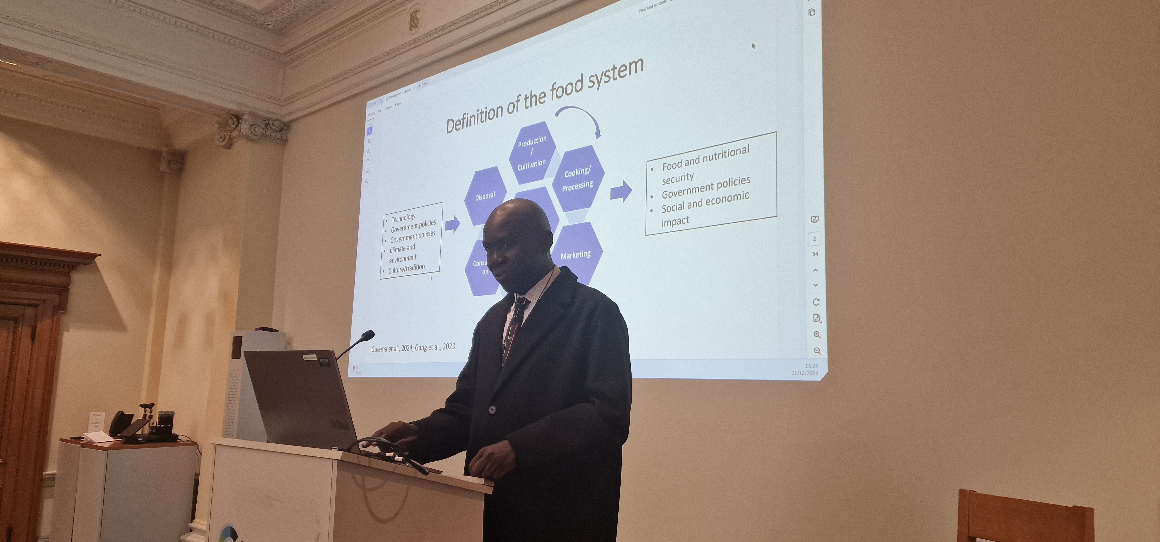Dr Francis Omujal, of Uganda's Ministry of Health, gives a presentation on the food system in his homeland