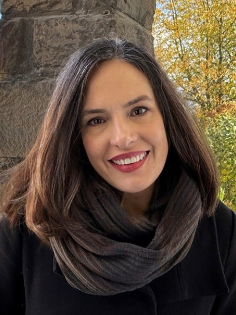 Serena DeBeer smiling for a picture