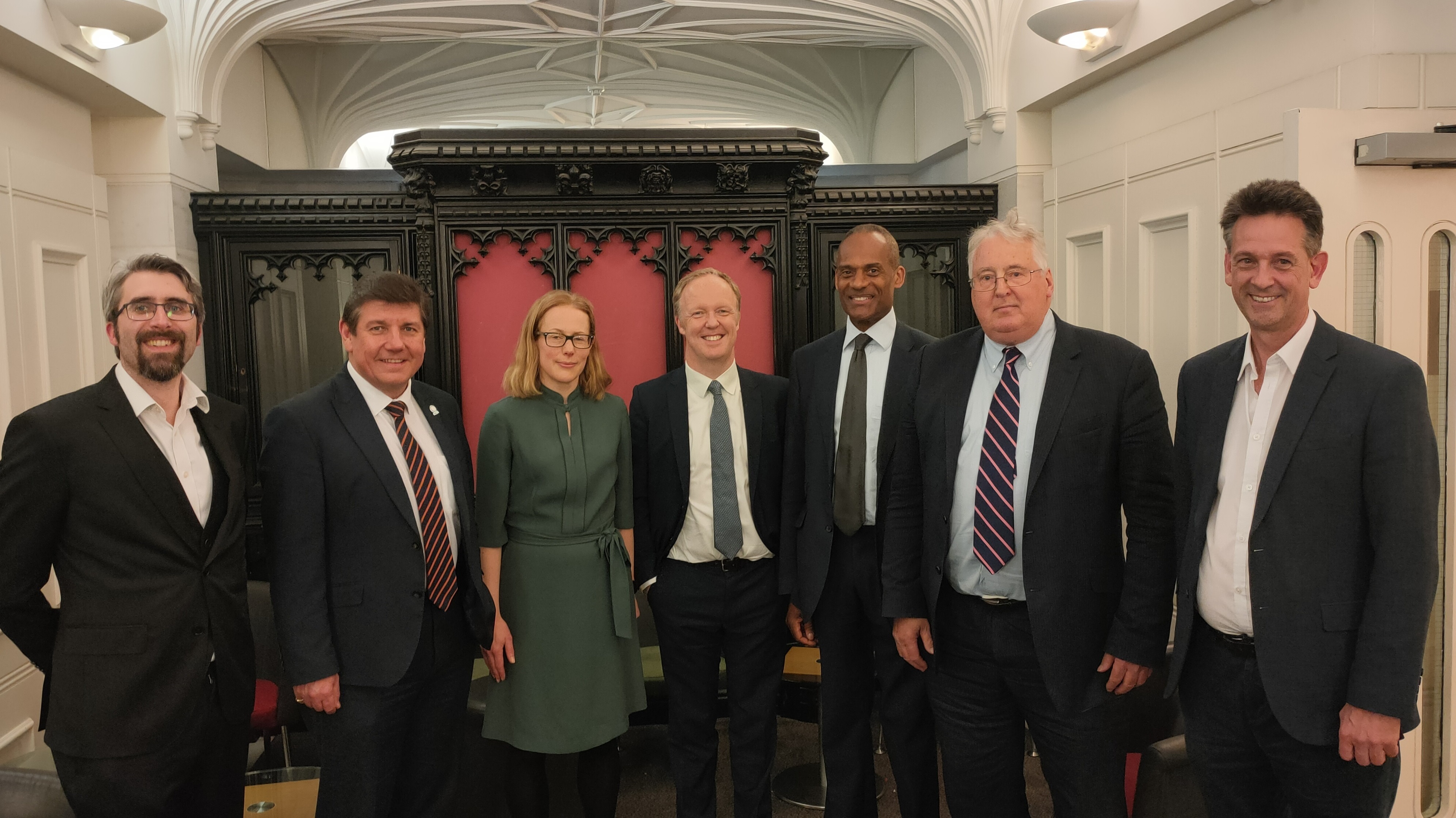 Dr Alexander Reip, Stephen Metcalfe MP, Tanya Sheridan, Dr Joe Marshall, Adam Afriyie MP, Stephen Benn and Professor Martin Freer pose together inside the House of Commons