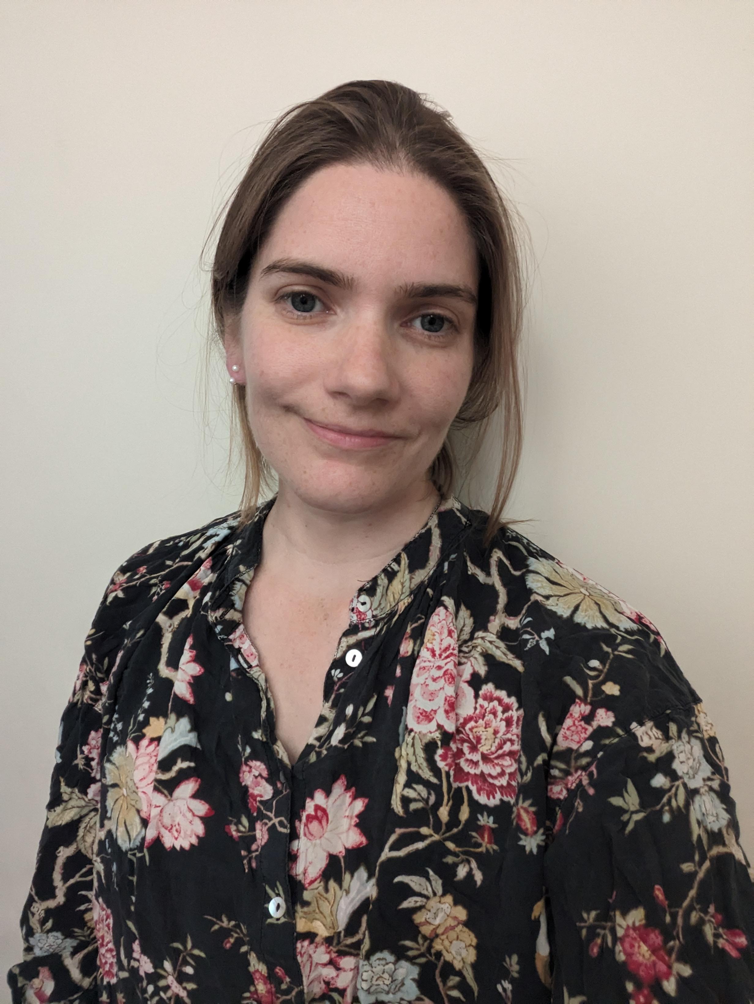 A portrait photograph of Izzi Monk