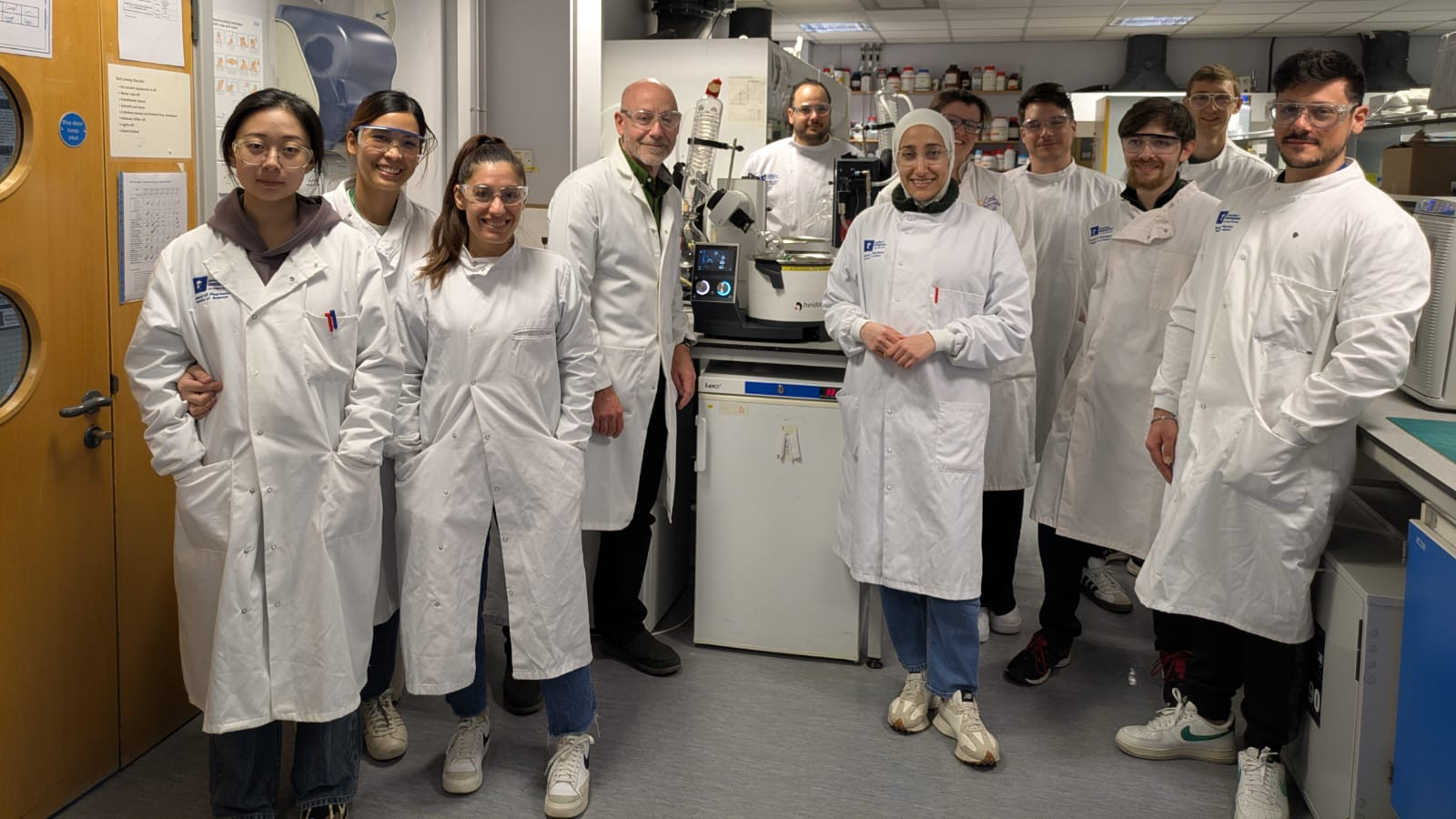 Professor Cameron Alexander's team in lab coats, Winner of the 2025 Interdisciplinary Prize