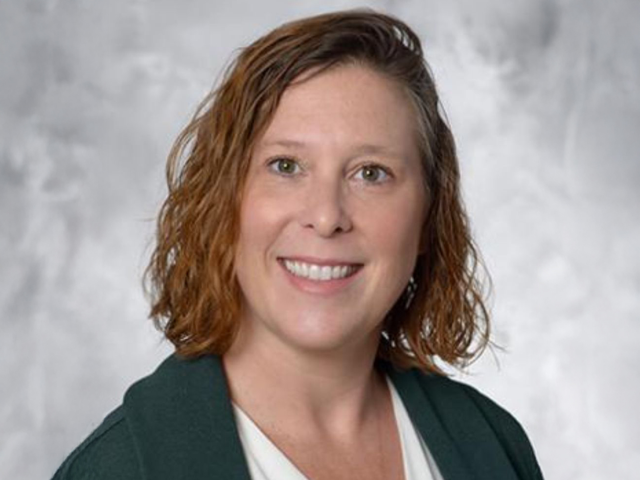 A headshot of Erin Ratcliff