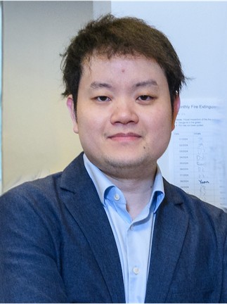 Headshot of Hua Wang
