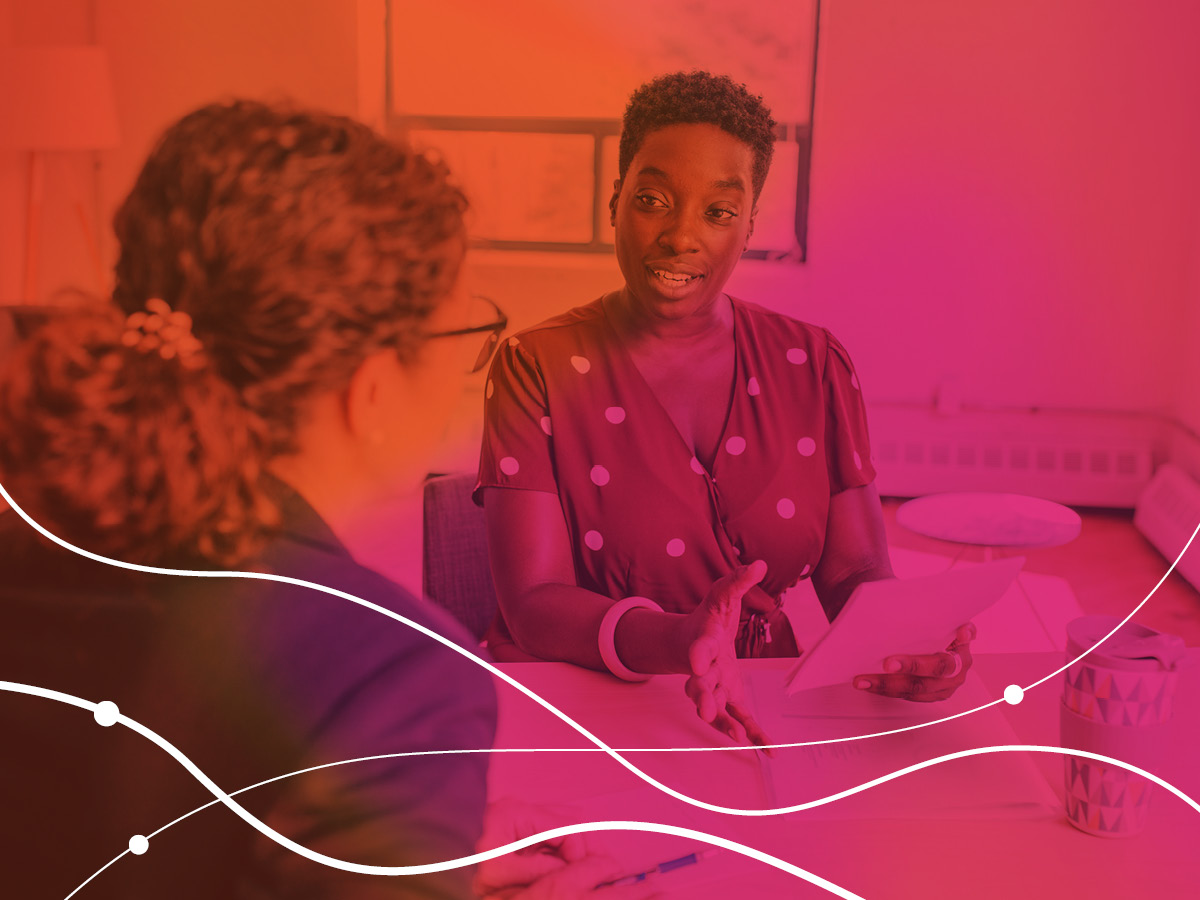 two people talking face to face