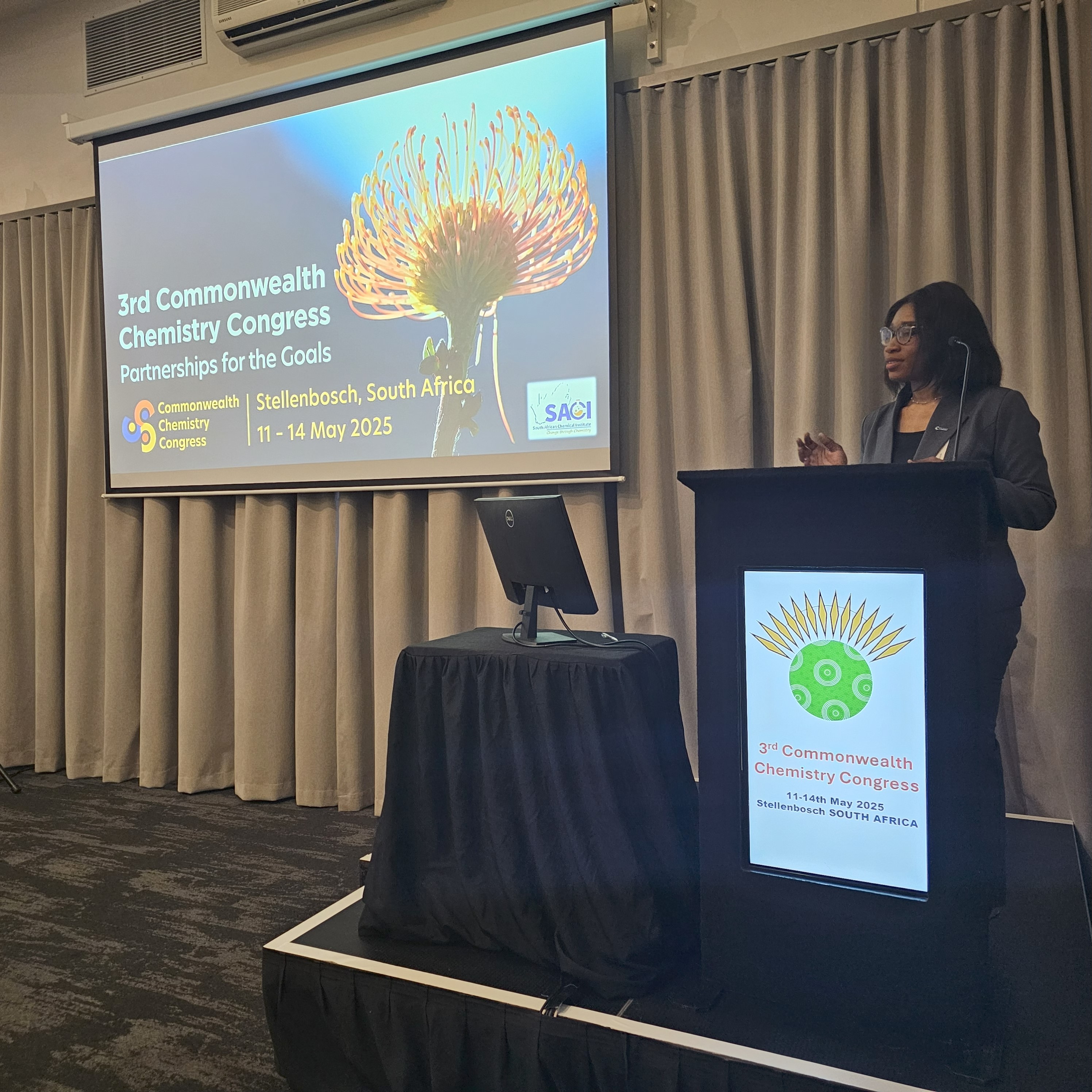 Dr Grace Tabi - Commonwealth Chemistry Congress 2026 (5) Dr Grace Tabi standing at a podium