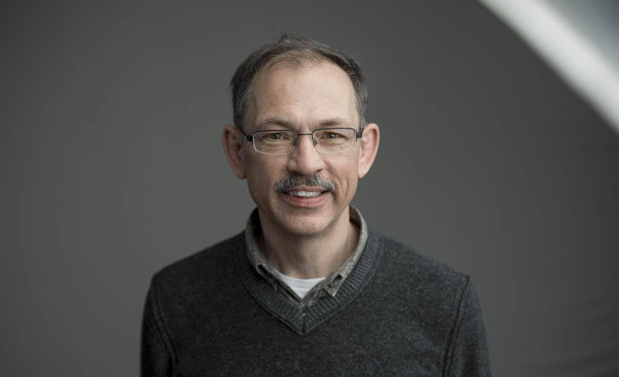 Geert-Jan Boons wearing glasses and a sweater