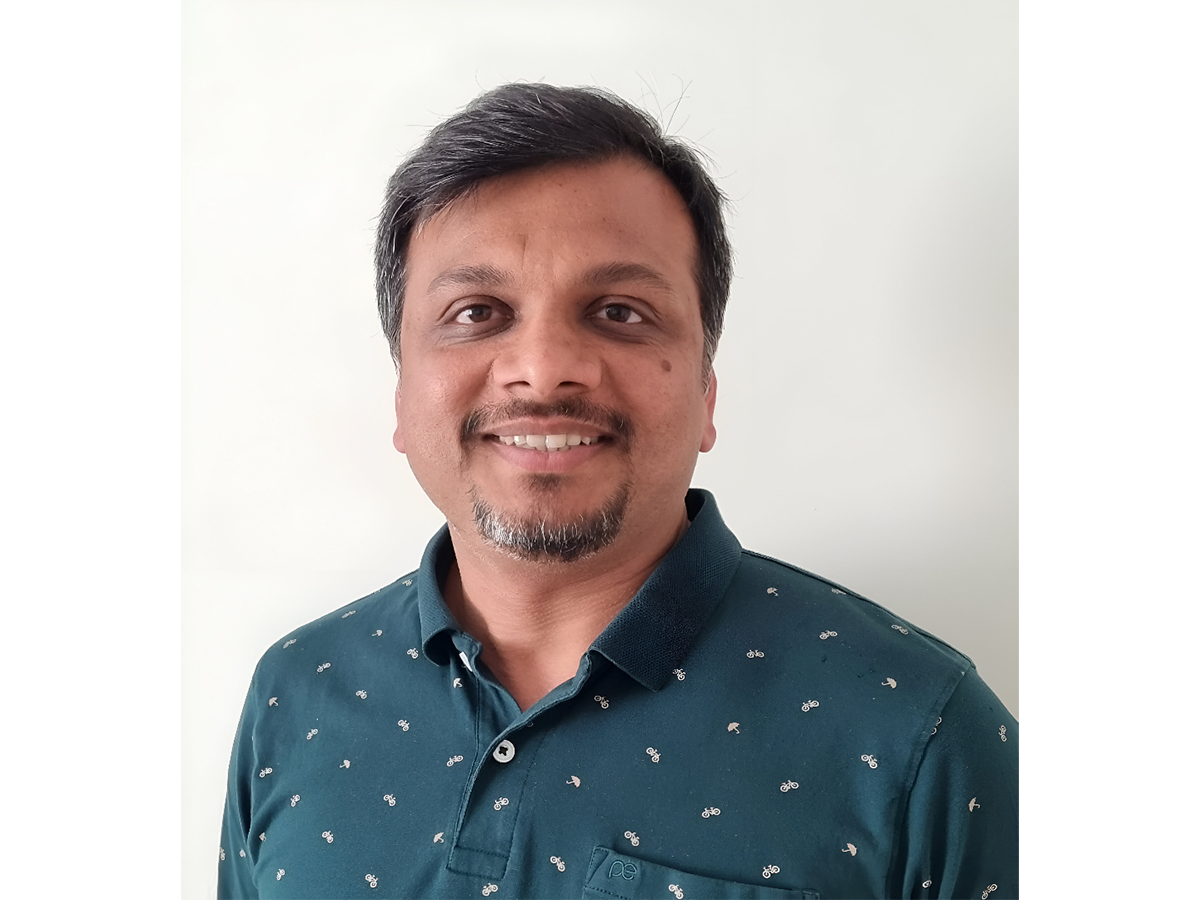 a man smiling for a picture