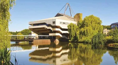Central Hall at the University of York with campus lake in foreground Central Hall at the University of York with campus lake in foreground