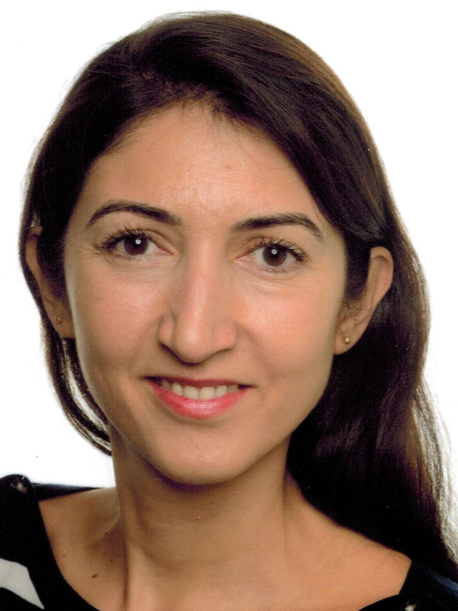 Selin Kara headshot, smiling to camera