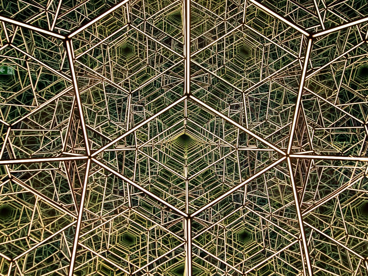 A green, black and white photo of a geometric pattern