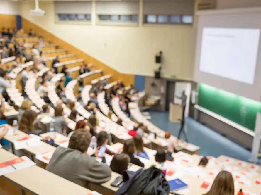 degree-accreditation-shutterstock_2291648325 a group of people in a lecture hall