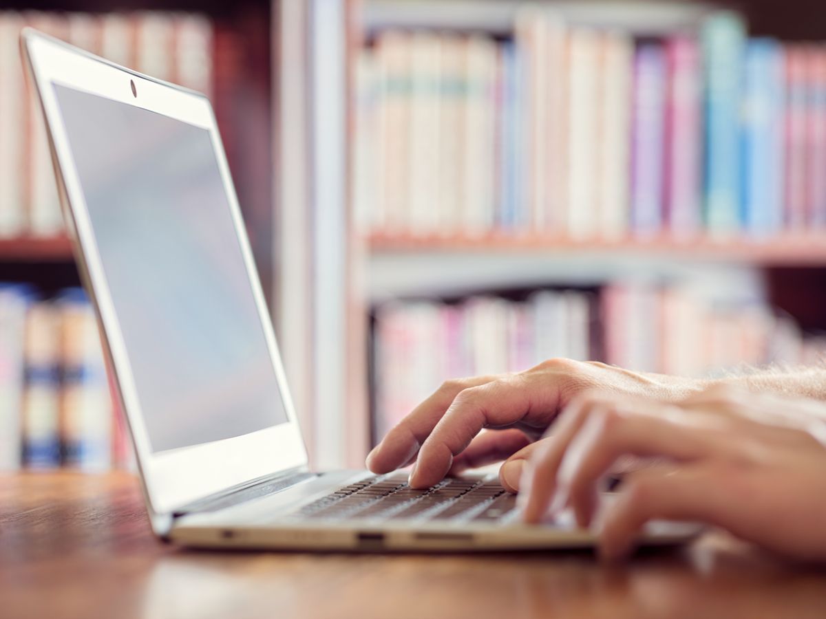Getty - human hands using laptop