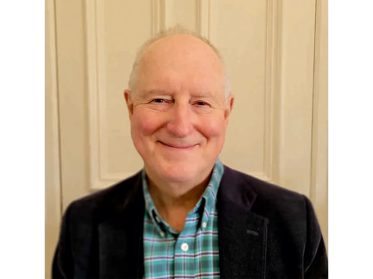 a man smiling at camera