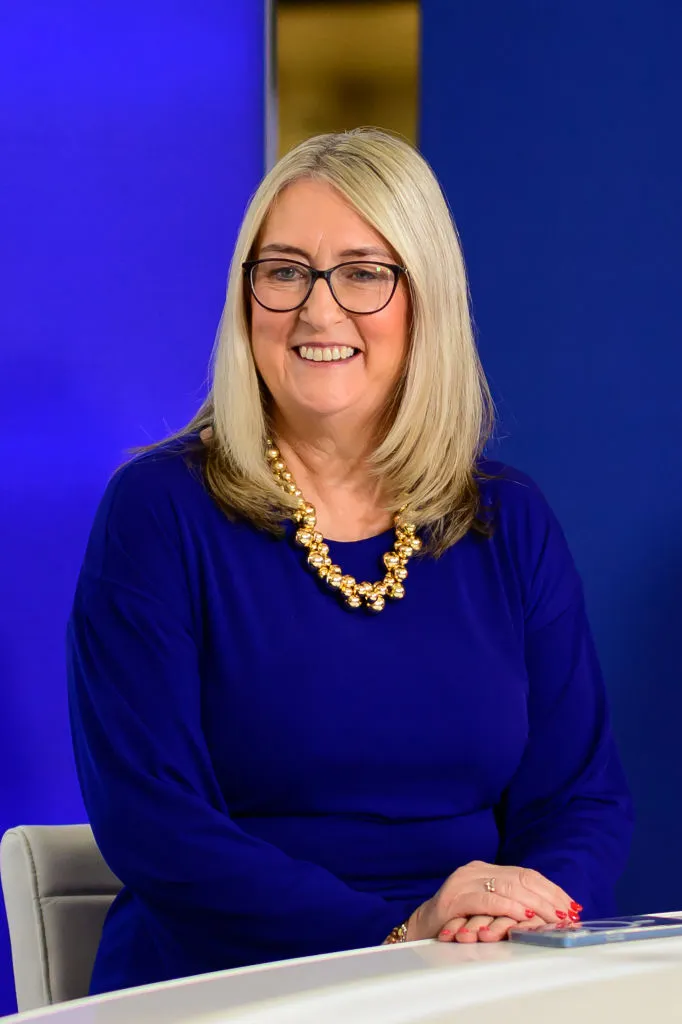 Baroness Smith of Malvern Baroness Smith of Malvern smiles while wearing a blue shirt and glasses