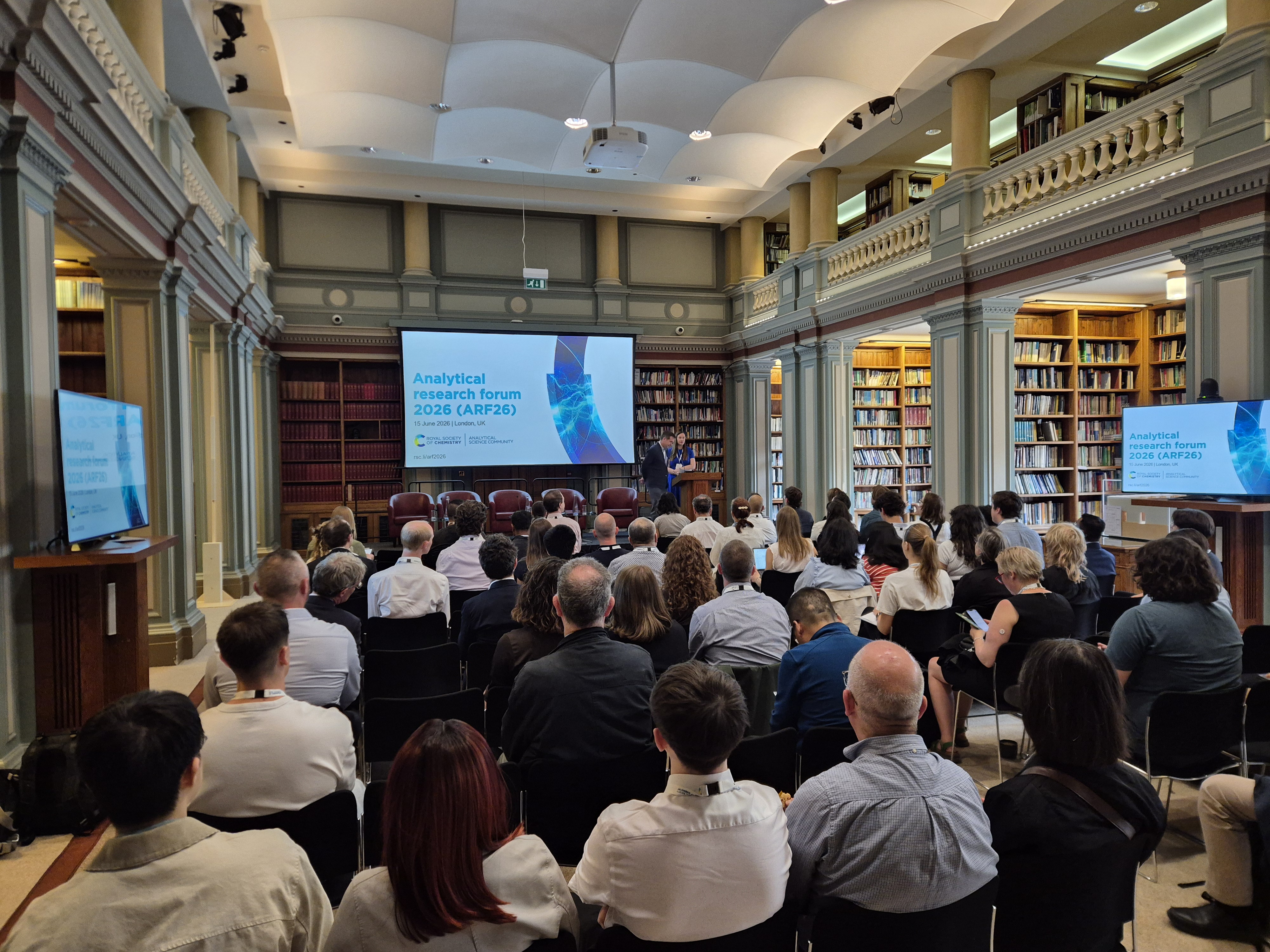 a group of people in a library