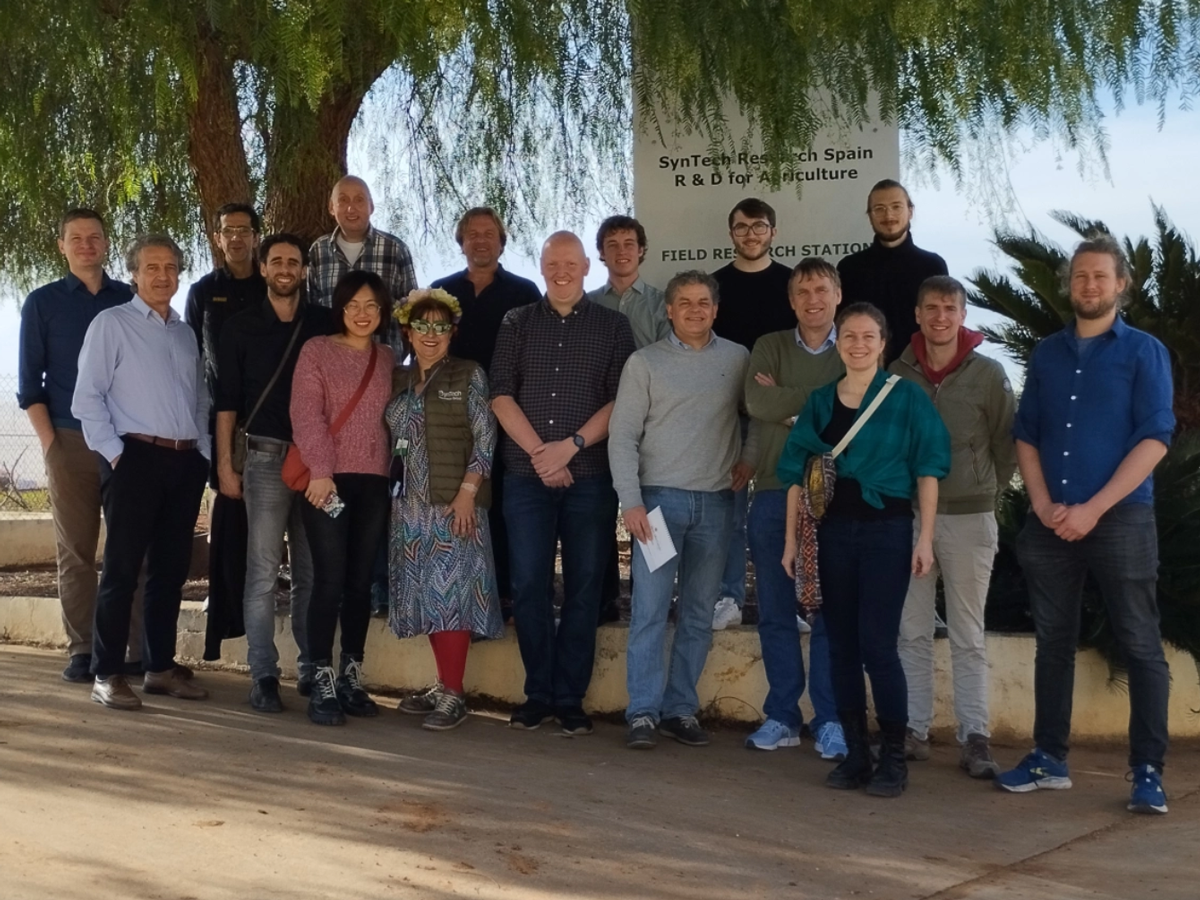 The BoostCrop team in a big group photo facing camera
