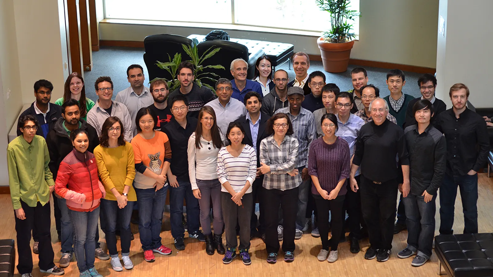 Gas-phase Heterogeneous Catalysis for Solar Fuels Research team posing as a large group to the camera, standing in their office