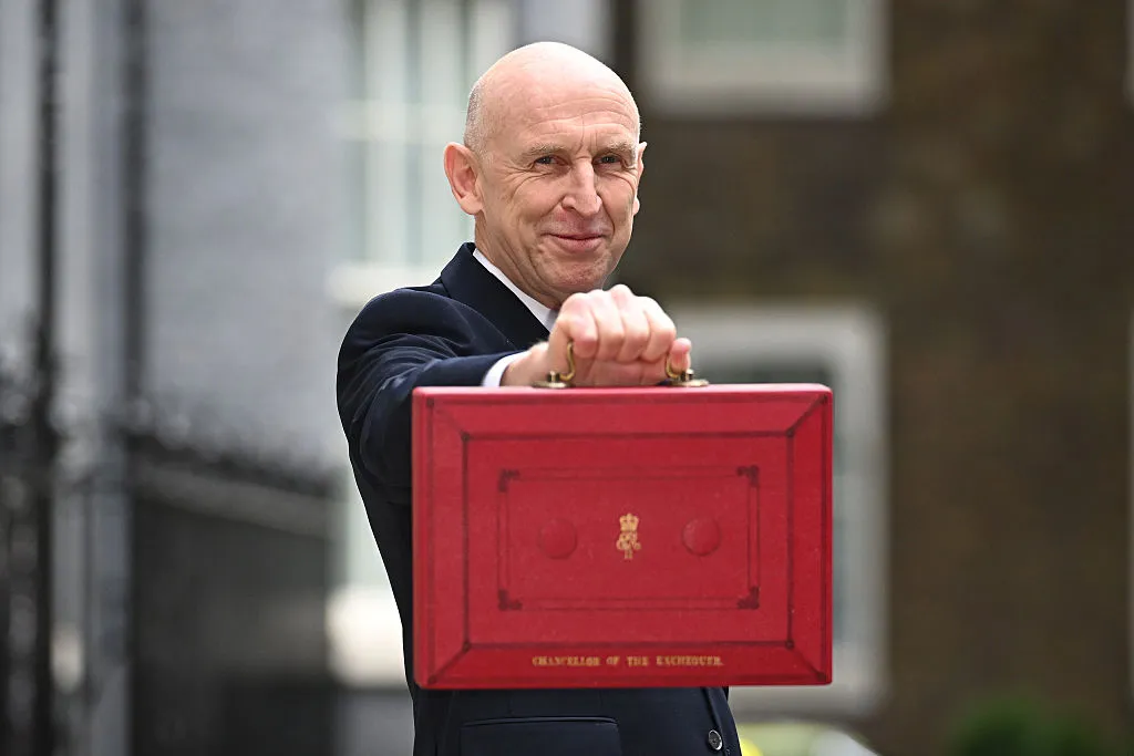 Chancellor of the Exchquer John Healey with the red box ahead of the 2026 Autumn Budget - GettyImage Chancellor John Healey leaves 11 Downing Street to present the Autumn Budget to Parliament on October 28, 2026 in London, England.