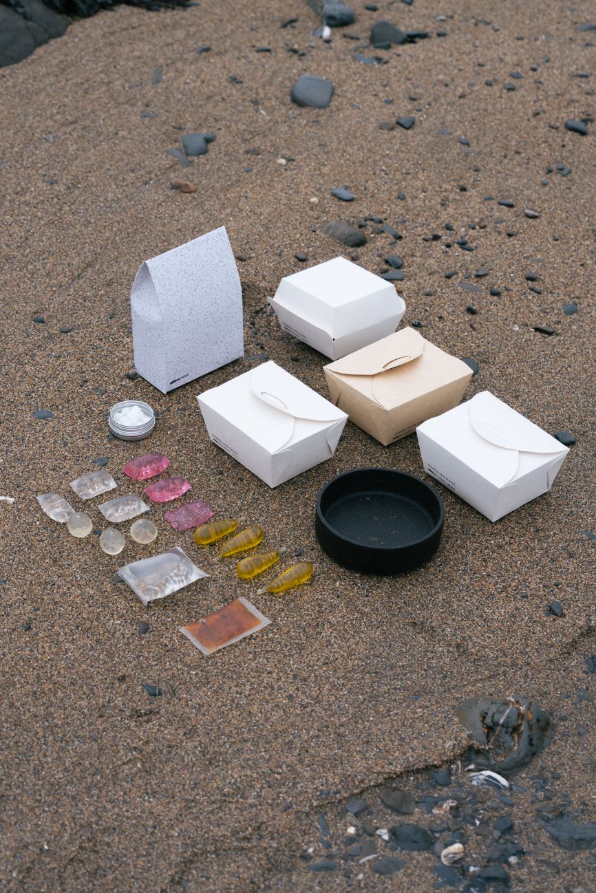 The full array of Notpla products sitting on a bit of ground