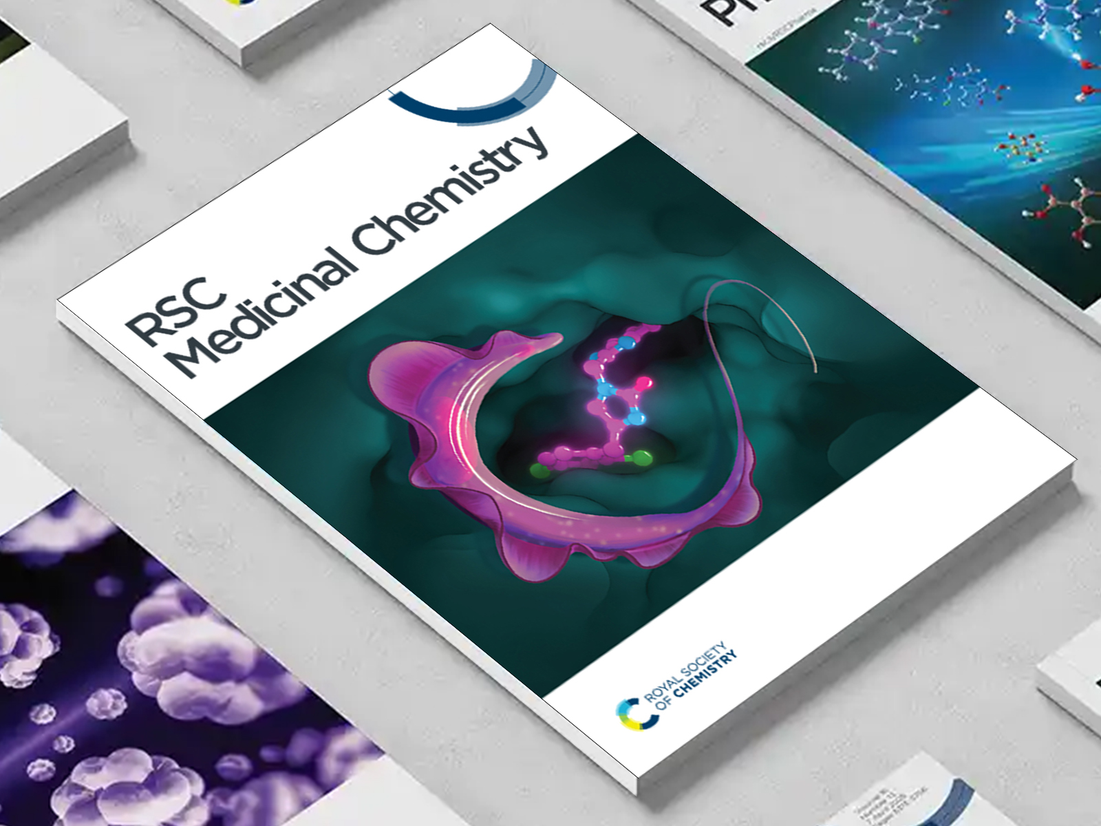 the RSC Medicinal Chemistry journal among a group of other journals on a desk