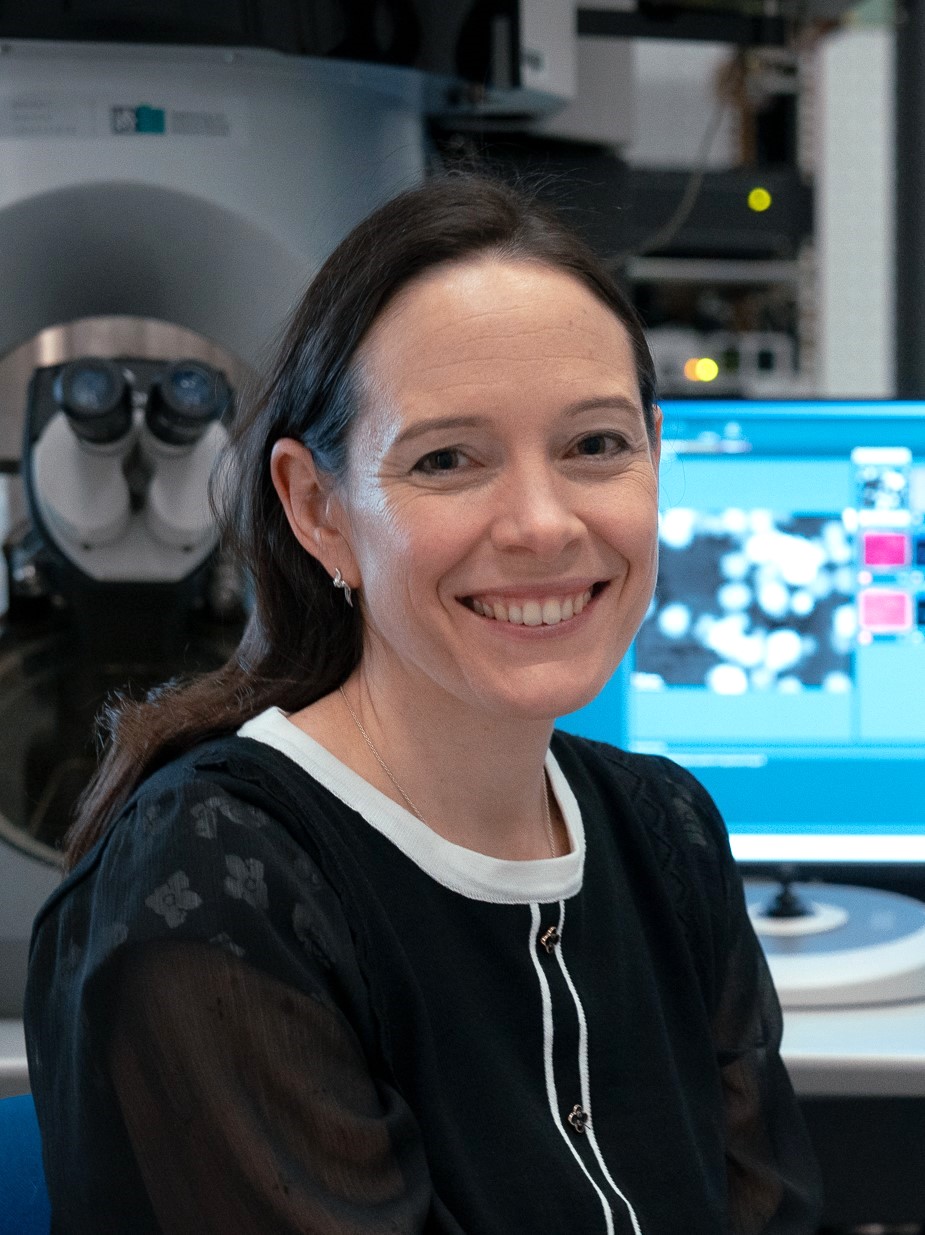 a woman smiling at camera