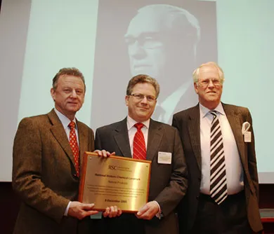 (From left to right) President Dr Simon Campbell, Professor Jeremy Sanders, Sandy Todd, son of Lord Todd (pictured in the backdrop)