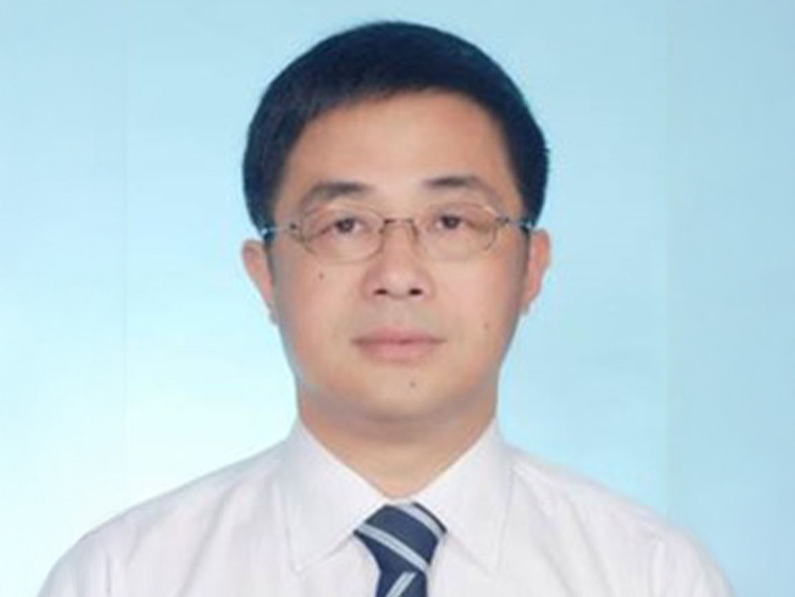 A headshot of Yong Cui
